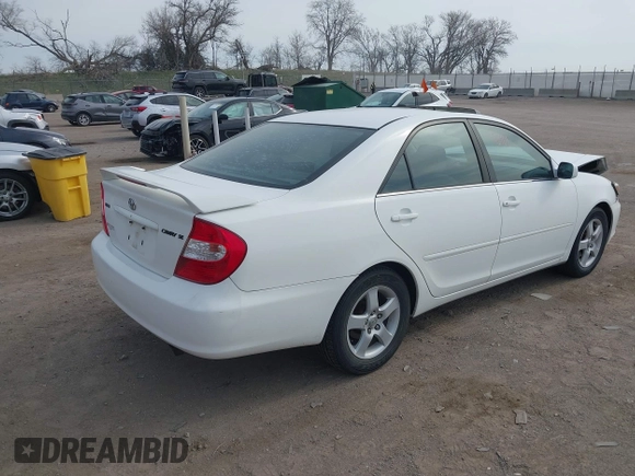 2003 Toyota Camry LE with VIN 4T1BE32K13U250477, listed as a IAAI auction lot 41996101 with 212,951 mi miles and . Bid and sale history available at DreamBid. Image 4.