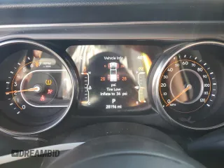 2022 Jeep Gladiator Willys with VIN 1C6HJTAG7NL117102, listed as a Copart auction lot 87679075 with 28,196 mi miles and Salvage title. Bid and sale history available at DreamBid. Image 9.