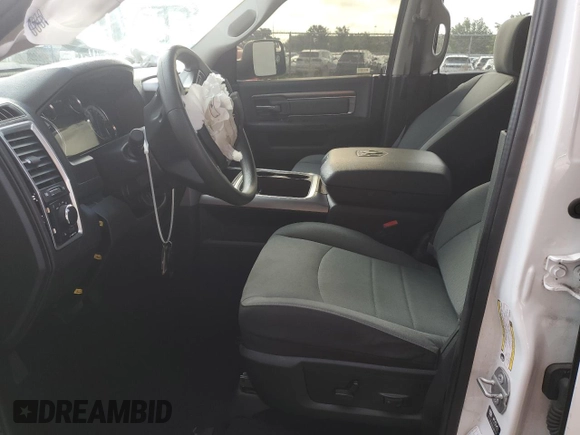 2023 Ram 1500 SLT z VIN 1C6RR6LG7PS533834, wystawiony jako Copart lot #57865545 z przebiegiem 45 449 mil mil oraz Nie do naprawy • Non repairable. Historia ofert i sprzedaży dostępna na DreamBid. Obrazek 7.