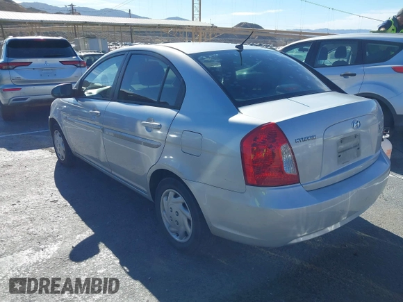 2006 Hyundai Accent GLS with VIN KMHCN46C16U023680, listed as a IAAI auction lot 41253207 with 157,398 mi miles. Bid and sale history available at carsss.com. Image 3.