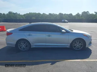 2015 Hyundai Sonata Sport with VIN 5NPE34AB0FH084580, listed as a IAAI auction lot 42150153 with 159,633 mi miles and . Bid and sale history available at carsss.com. Image 14.