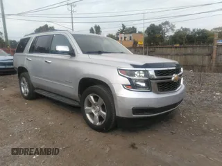 2017 Chevrolet Tahoe LS z VIN 1GNSKAKC1HR336710, wystawiony jako IAAI lot #40518910 z przebiegiem 135 717 mil mil oraz . Historia ofert i sprzedaży dostępna na DreamBid. Obrazek 1.