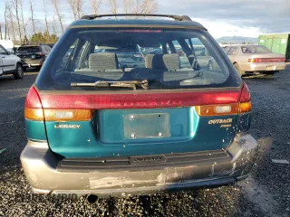 1996 Subaru Legacy Outback with VIN 4S3BG6851T7977375, listed as a Copart auction lot 41391625 with 188,726 mi miles and Salvage title. Bid and sale history available at DreamBid. Image 6.