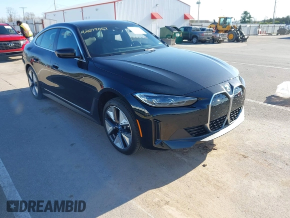 2024 BMW i4 xDrive40 z VIN WBY83FB05RFS69775, wystawiony jako IAAI lot #42079067 z przebiegiem 4 607 mil mil oraz . Historia ofert i sprzedaży dostępna na DreamBid. Obrazek 1.