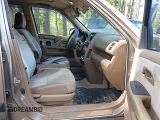 2004 Honda CR-V EX with VIN SHSRD78804U236128, listed as a IAAI auction lot 42041421 with 241,851 mi miles and . Bid and sale history available at carsss.com. Image 5.