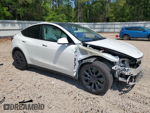 2022 Tesla Model Y Long Range z VIN 7SAYGDEE1NF354633, wystawiony jako Copart lot #55221835 z przebiegiem 53 821 mil mil oraz Szkoda całkowita • Salvage title. Historia ofert i sprzedaży dostępna na DreamBid. Obrazek 4.