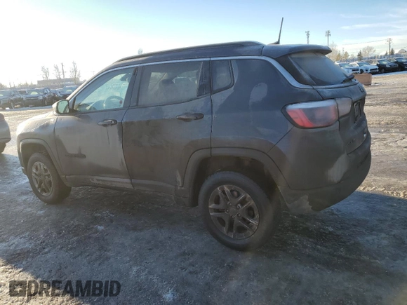 2020 Jeep Compass Sport with VIN 3C4NJDAB1LT112288, listed as a Copart auction lot 87818745 with 142,408 mi miles and Clean Title. Bid and sale history available at DreamBid. Image 2.