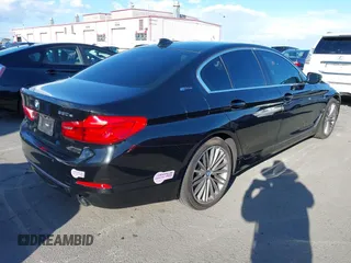 2019 BMW 5 Series 530e iPerformance with VIN WBAJA9C53KB388861, listed as a IAAI auction lot 41621712 with 68,128 mi miles. Bid and sale history available at carsss.com. Image 4.