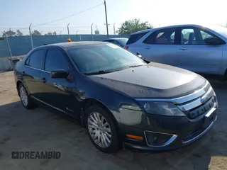 2010 Ford Fusion Hybrid z VIN 3FADP0L34AR189343, wystawiony jako IAAI lot #42404084 z przebiegiem 260 417 mil mil oraz . Historia ofert i sprzedaży dostępna na DreamBid. Obrazek 1.