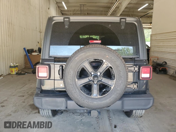 2020 Jeep Wrangler Unlimited Sport Altitude with VIN 1C4HJXDN9LW154318, listed as a Copart auction lot 56473335 with 99,482 mi miles and Salvage title. Bid and sale history available at DreamBid. Image 6.