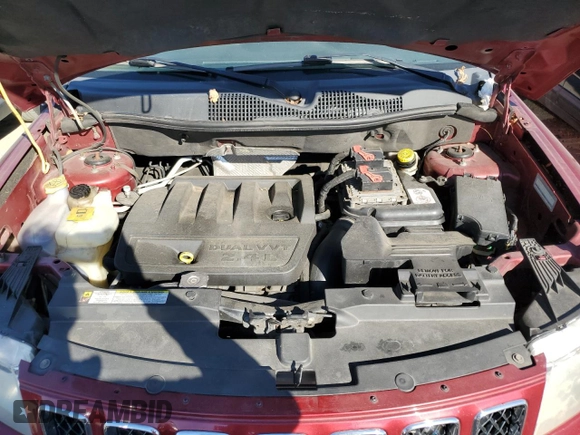 2012 Jeep Compass Sport with VIN 1C4NJCBB2CD631834, listed as a Copart auction lot 82886354 with 208,705 mi miles and Salvage Title. Bid and sale history available at carsss.com. Image 12.