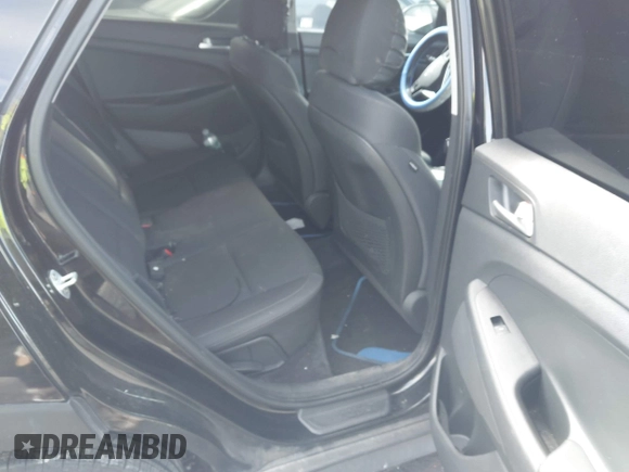 2019 Hyundai Tucson SE with VIN KM8J2CA46KU977863, listed as a IAAI auction lot 41704318 with 23,076 mi miles. Bid and sale history available at carsss.com. Image 8.