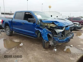 2023 Ford F-150 XL with VIN 1FTEW1EP6PKD00320, listed as a IAAI auction lot 41562733 with 19,468 mi miles. Bid and sale history available at carsss.com. Image 1.