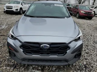 2024 Subaru Crosstrek z VIN JF2GUABC9R8887498, wystawiony jako Copart lot #52479215 z przebiegiem 988 mil mil oraz Szkoda całkowita • Salvage title. Historia ofert i sprzedaży dostępna na DreamBid. Obrazek 5.