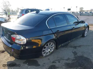 2006 BMW 3 Series 330i with VIN WBAVB33536KS34412, listed as a IAAI auction lot 41872877 with 196,697 mi miles. Bid and sale history available at carsss.com. Image 4.