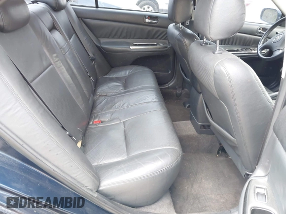 2003 Toyota Camry LE with VIN 4T1BE32K13U241259, listed as a IAAI auction lot 41907480 with 281,229 mi miles and . Bid and sale history available at DreamBid. Image 8.