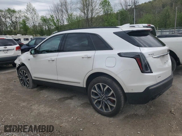 2023 Cadillac XT5 AWD Sport with VIN 1GYKNGRS4PZ176086, listed as a Copart auction lot 53955535 with 15,709 mi miles and Salvage title. Bid and sale history available at DreamBid. Image 2.
