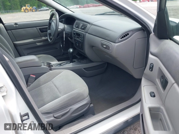 2007 Ford Taurus SE z VIN 1FAFP53U57A101188, wystawiony jako IAAI lot #42102585 z przebiegiem Nie podano mil oraz . Historia ofert i sprzedaży dostępna na DreamBid. Obrazek 5.