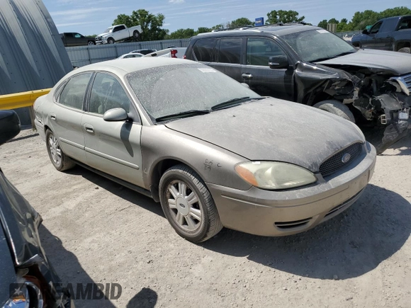 2007 Ford Taurus SEL with VIN 1FAFP56U97A177718, listed as a Copart auction lot 58003135 with 122,079 mi miles and Salvage title. Bid and sale history available at DreamBid. Image 4.