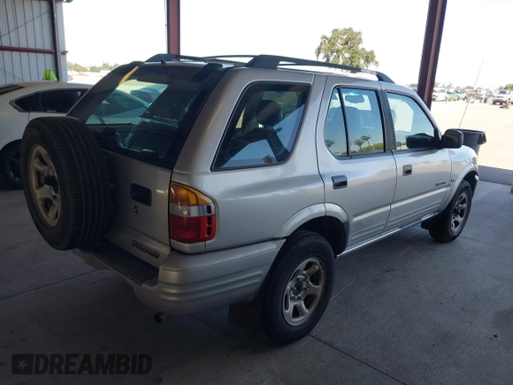 2001 Honda Passport LX z VIN 4S6CK58WX14402974, wystawiony jako IAAI lot #42374779 z przebiegiem 214 931 mil mil oraz . Historia ofert i sprzedaży dostępna na DreamBid. Obrazek 4.