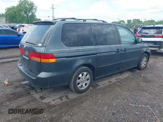 2003 Honda Odyssey EX-L with VIN 5FNRL18943B146897, listed as a IAAI auction lot 42144055 with 364,223 mi miles and . Bid and sale history available at DreamBid. Image 4.