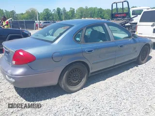 2000 Ford Taurus SE with VIN 1FAFP53U1YG213906, listed as a IAAI auction lot 42064922 with 117,043 mi miles and . Bid and sale history available at carsss.com. Image 4.