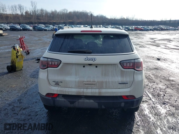 2019 Jeep Compass Latitude with VIN 3C4NJDBB7KT703593, listed as a IAAI auction lot 41490224 with 99,640 mi miles. Bid and sale history available at carsss.com. Image 16.