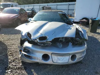2002 Pontiac Firebird Formula z VIN 2G2FV22G822152907, wystawiony jako Copart lot #87459634 z przebiegiem 64 858 mil mil oraz Szkody całkowita. Historia ofert i sprzedaży dostępna na DreamBid. Obrazek 5.