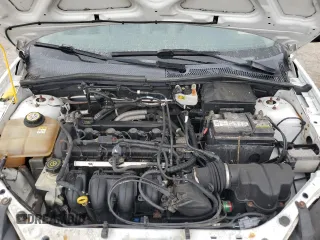 2007 Ford Focus S z VIN 1FAHP34N57W223198, wystawiony jako Copart lot #55725345 z przebiegiem 174 833 mil mil oraz Szkoda całkowita • Salvage title. Historia ofert i sprzedaży dostępna na DreamBid. Obrazek 11.