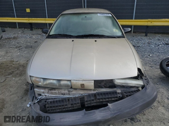 1997 Saturn SL with VIN 1G8ZH5285VZ365951, listed as a Copart auction lot 70902264 with 104,781 mi miles and Salvage Title. Bid and sale history available at carsss.com. Image 5.