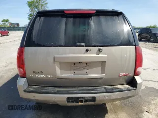 2007 GMC Yukon XL SLT z VIN 1GKFK16387J173009, wystawiony jako Copart lot #54010965 z przebiegiem 264 446 mil mil oraz Czysty tytuł • Clean title. Historia ofert i sprzedaży dostępna na DreamBid. Obrazek 6.