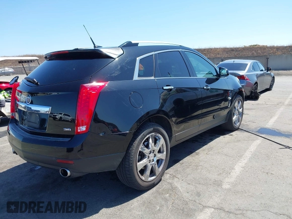 2012 Cadillac SRX Performance Collection z VIN 3GYFNBE30CS659973, wystawiony jako IAAI lot #42555119 z przebiegiem 141 842 mil mil oraz . Historia ofert i sprzedaży dostępna na DreamBid. Obrazek 4.