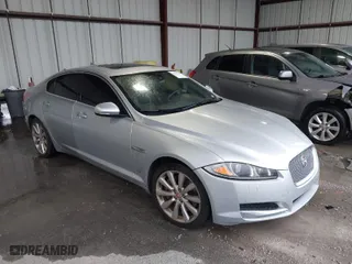 2014 Jaguar XF V6 SC with VIN SAJWJ0EF9E8U17227, listed as a IAAI auction lot 40455665 with 125,196 mi miles. Bid and sale history available at carsss.com. Image 1.
