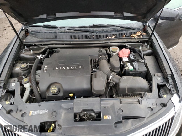 2015 Lincoln MKS with VIN 1LNHL9DK7FG606935, listed as a Copart auction lot 81991384 with 82,097 mi miles and Salvage Title. Bid and sale history available at carsss.com. Image 12.