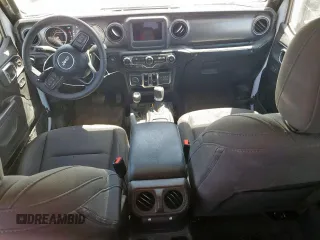 2023 Jeep Gladiator Sport S with VIN 1C6HJTAG4PL564716, listed as a Copart auction lot 57489125 with 20,971 mi miles and Salvage title. Bid and sale history available at DreamBid. Image 8.