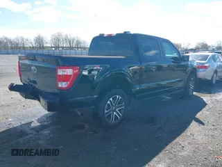 2023 Ford F-150 XL with VIN 1FTFW1E5XPKD67683, listed as a IAAI auction lot 41601078 with 32,433 mi miles. Bid and sale history available at carsss.com. Image 4.