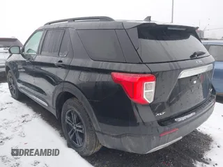 2021 Ford Explorer XLT with VIN 1FMSK8DH0MGA59737, listed as a IAAI auction lot 41474554 with 74,536 mi miles. Bid and sale history available at carsss.com. Image 3.