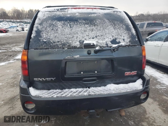2006 GMC Envoy SLT with VIN 1GKDT13S562338202, listed as a Copart auction lot 87326504 with 158,468 mi miles and Clean Title. Bid and sale history available at carsss.com. Image 6.