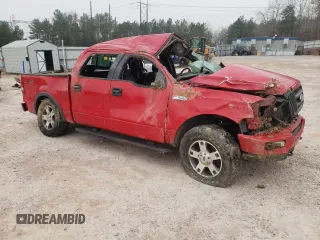2005 Ford F-150 XLT with VIN 1FTPW14545KD00936, listed as a Copart auction lot 48127085 with 239,043 mi miles and Salvage Title. Bid and sale history available at carsss.com. Image 4.