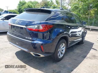 2016 Lexus RX 350 with VIN JTJBZMCA2G2001429, listed as a IAAI auction lot 42202436 with Not provided miles and . Bid and sale history available at DreamBid. Image 4.