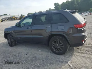 2016 Jeep Grand Cherokee 75th Anniversary with VIN 1C4RJEAG1GC506443, listed as a Copart auction lot 59874015 with 135,714 mi miles and Salvage title. Bid and sale history available at DreamBid. Image 2.