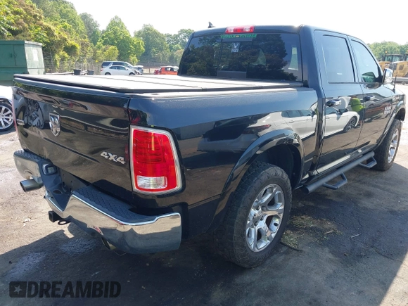 2016 Ram 1500 Laramie z VIN 1C6RR7NT4GS397534, wystawiony jako IAAI lot #42159199 z przebiegiem 120 322 mil mil oraz . Historia ofert i sprzedaży dostępna na DreamBid. Obrazek 4.