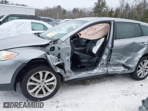 2012 Mazda CX-9 Grand Touring with VIN JM3TB3DV2C0353558, listed as a IAAI auction lot 41397266 with 158,843 mi miles and . Bid and sale history available at DreamBid. Image 6.