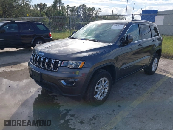 2018 Jeep Grand Cherokee Altitude with VIN 1C4RJFAG9JC459143, listed as a IAAI auction lot 38138630 with 71,150 mi miles and . Bid and sale history available at DreamBid. Image 2.
