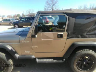 2003 Jeep Wrangler Sport with VIN 1J4FA49S53P365363, listed as a IAAI auction lot 41818320 with 154,567 mi miles. Bid and sale history available at carsss.com. Image 14.