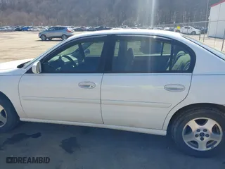 2003 Chevrolet Malibu LS with VIN 1G1NE52J53M622092, listed as a IAAI auction lot 41738623 with 93,092 mi miles. Bid and sale history available at carsss.com. Image 14.