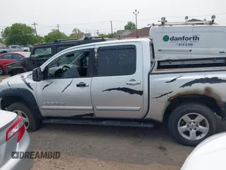 2006 Nissan Titan SE with VIN 1N6AA07BX6N562442, listed as a IAAI auction lot 42411727 with 203,862 mi miles and . Bid and sale history available at DreamBid. Image 14.
