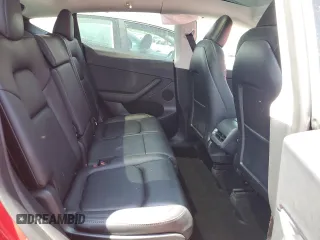 2023 Tesla Model Y Long Range z VIN 7SAYGAEE8PF701618, wystawiony jako Copart lot #57573875 z przebiegiem 39 463 mil mil oraz Szkoda całkowita • Salvage title. Historia ofert i sprzedaży dostępna na DreamBid. Obrazek 10.