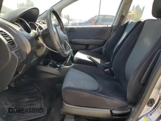 2007 Honda Fit Sport with VIN JHMGD37617S043208, listed as a Copart auction lot 64594825 with 210,672 mi miles and Clean title. Bid and sale history available at DreamBid. Image 7.