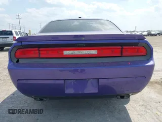 2014 Dodge Challenger R/T z VIN 2C3CDYBT0EH143576, wystawiony jako IAAI lot #42333984 z przebiegiem 189 874 mil mil oraz . Historia ofert i sprzedaży dostępna na DreamBid. Obrazek 16.